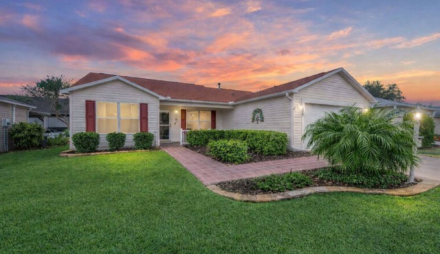A Private Oasis! Enjoy this beautifully updated 3/2 home. Golf car included!