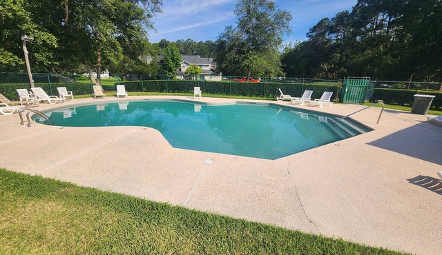 Adorable 3/2, with community pool and centrally located