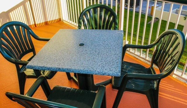 Beachfront 2BR Retreat | Balcony + Full Kitchen