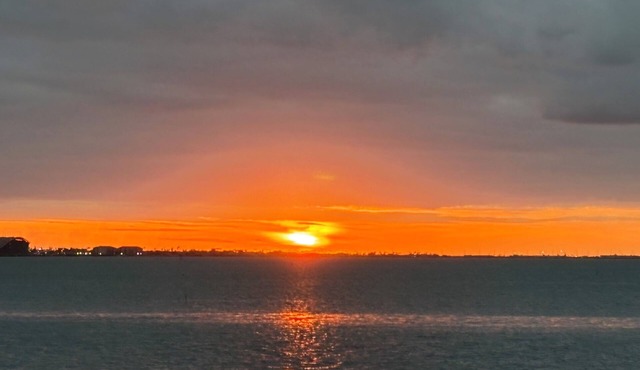 Beachfront Cozy 2-bedroom 1- bath condo with AC in serene South Padre Island.