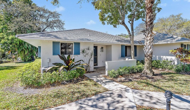 Beautifully updated, end unit, waterfront club cottage. 2BR 2BA + Pool and More!