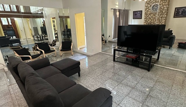Blocks a way to Universal Studios. Full Single Family with pool, and amenities.