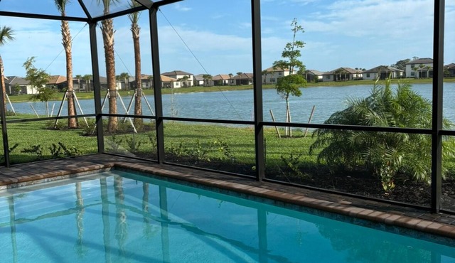 Brand New! 4 Bedroom home with a Heated pool in Gated Community