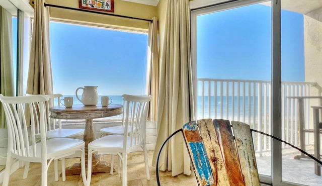Cozy Beachfront Retreat right on the Sand, Sparkling Pool, & Charming Coastal Flair!