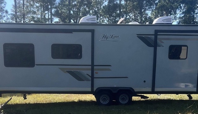 Cozy RV in Palm Bay, FL with pool access!