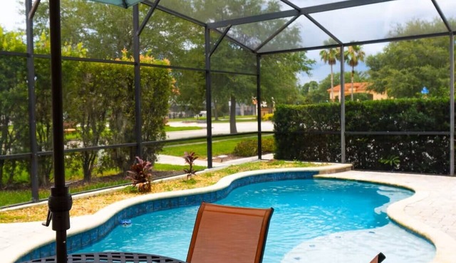 Disney 4-bedroom house with pool, 3 baths, fitness room, WiFi, resort amenities