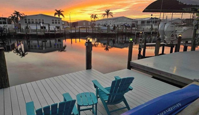 Dog-friendly, canal-front getaway with a dock, screened lanai, & washer/dryer