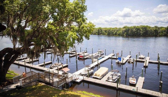 Enjoy sunsets on the St. Johns River- Waterfront Property with boat slip!