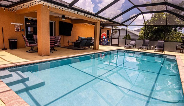 Enjoy the Salt Life with this Heated Saltwater Pool and outdoor lanai.