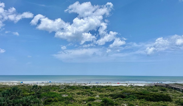 FREE FUN EVERYDAY! Beautiful corner unit with breathtaking views of the Atlantic Ocean.