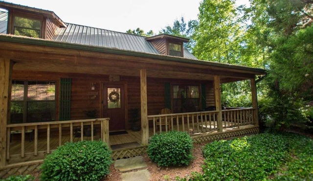 Hunker Down by the Creekbank in this Cozy Private