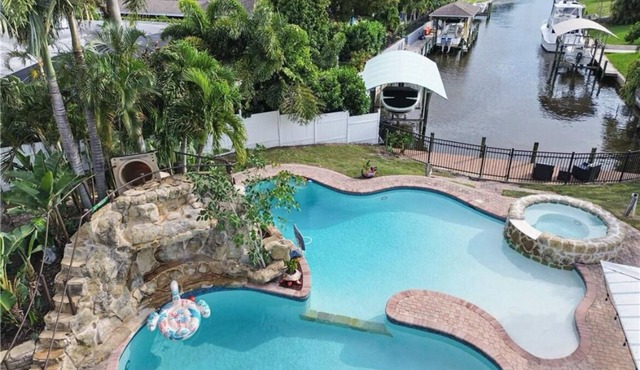Luxury Waterfront Home w Pool HotTub and Waterslide. Off McGregor near Beaches