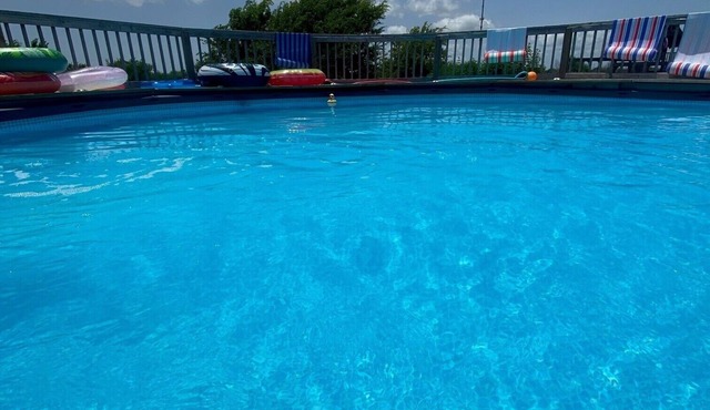 Mini resort with peaceful property includes pool and fun. Fishin Mission !