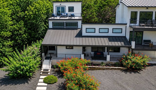 Modern Stunner Walkable to Lake Travis + Views! in Austin