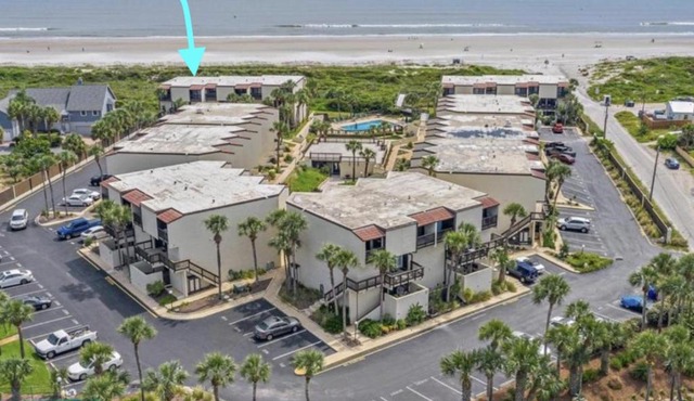 Oceanfront condo with resort amenities, beach access and pool