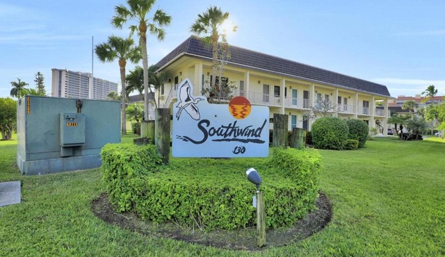 Peaceful condo with pool and brief walk to beach