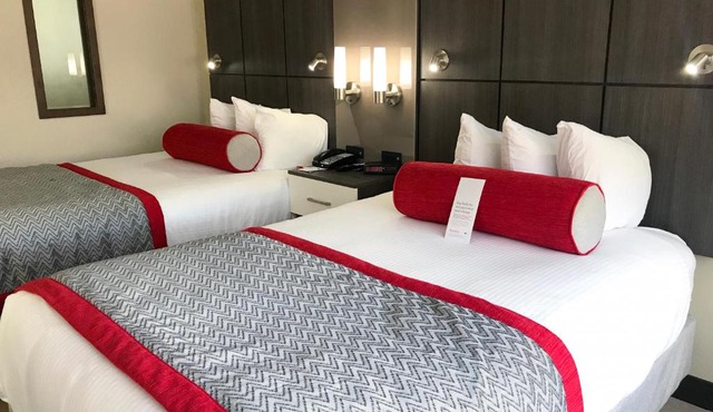 Ramada by Wyndham Suites Orlando Airport- Free Airport Shuttle