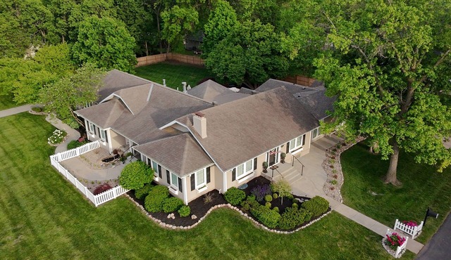 Ranch style 4-bedroom home on a short acre in Kansas City North (12 miles from Arrowhead Stadium) with an open floor plan and approx. 4000 sq. ft. of living area. A gourmet kitchen, and a large private deck w/BBQ. Ideal Major international sporting event getaway!
