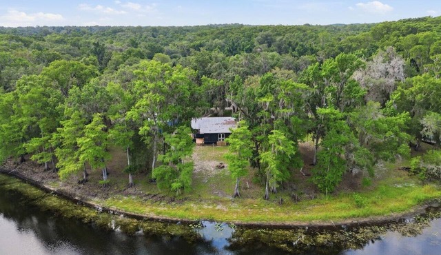 Riverfront Cabin w Screened Patio & Fire Pit!