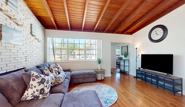 Single-level home with private yard, screened patio, AC, & W/D