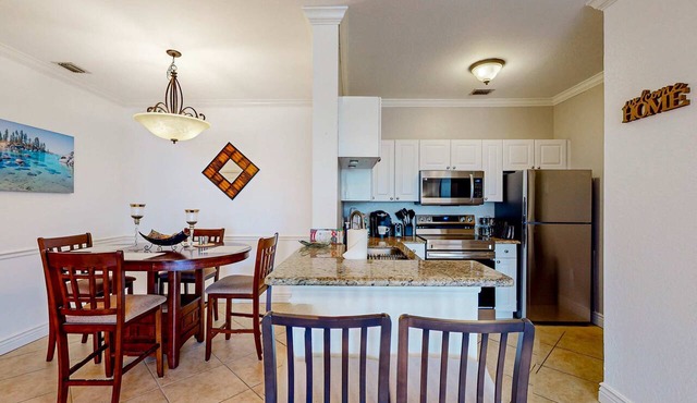 Snowbird friendly condo with pool hot tub sauna fitness room and on site tennis