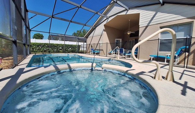 South facing four bedroom home, solar heated private pool, spa and games room.