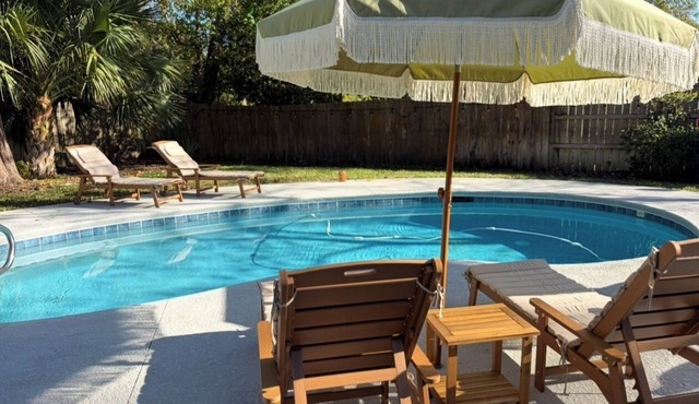 Spacious 4 Bed/3 Bath house with pool, fenced backyard, fire pit, covered porch.