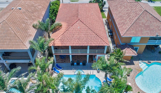 Spacious Bayside Retreat with Large Heated Pool & Hot Tub!