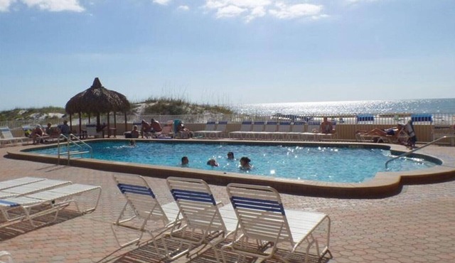 Stay on the Beach! Cozy Condo with Large Heated Pool