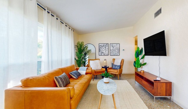 Sunlit & stylish dog-friendly retreat with great patio - steps from the shore