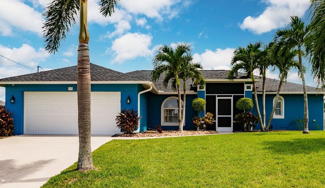 Sunny Waterfront Oasis: Your Dream Pool Home with Southern Exposure
