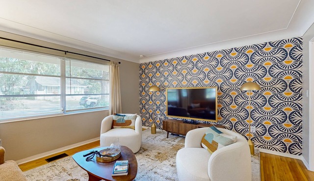 Walk to downtown at this charming home with bikes, wifi, and cornhole