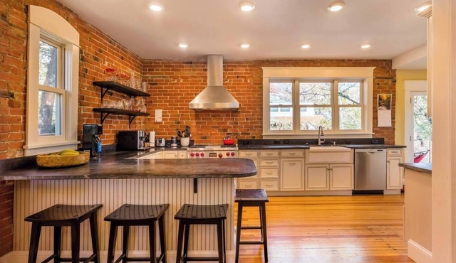 Walk to Pearl St from Luxury Historic Home w/Chef's Kitchen & Private Yard