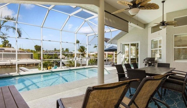Waterfront 3BR Marco Island home with heated pool and free WiFi.