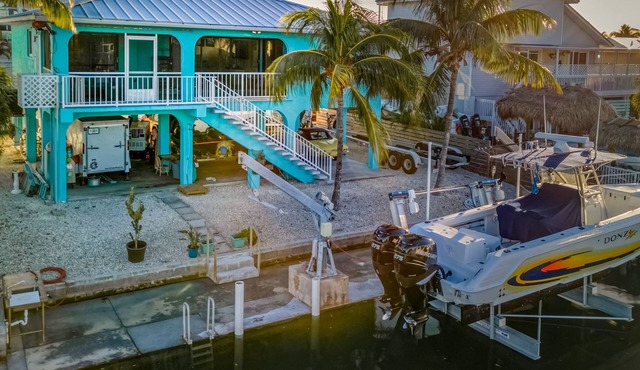 Waterfront home with boat/canal access, screened lanai, & renovated interior