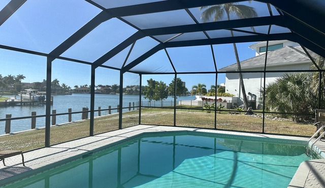 Waterfront home with south facing pool & views over the bay