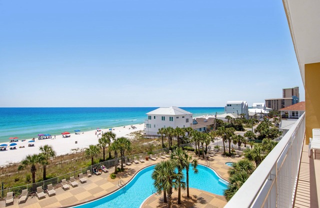 Sizable condo w/private balcony & gulf views - located right on the beach