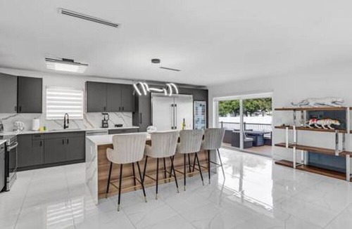 Hallandale Beach Villa | Luxe Waterfront Heated Pool Home