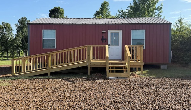 Lightfoot LakeHouse - Terrific 1-bedroom house in cozy Huxley, TX at Toledo Bend